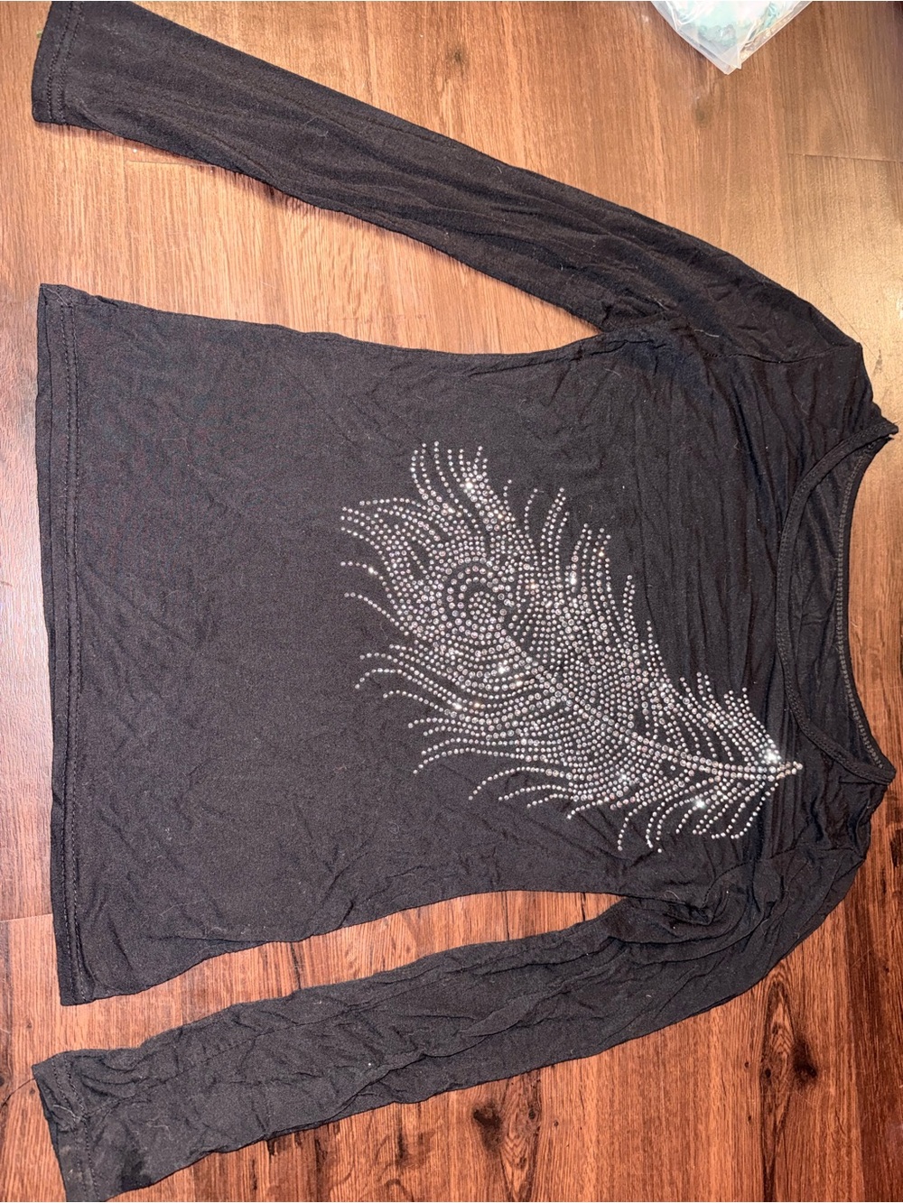 Black Long-Sleeve Women's Top with Sparkling Feather Rhinestone Accent